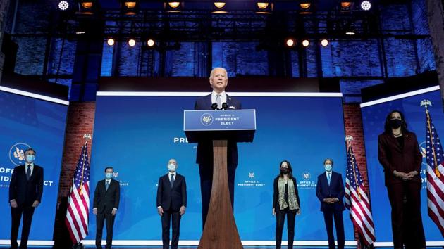 President-elect Joe Biden stands with his nominees for his national security team at his transition headquarters in the Queen Theater in Wilmington, Delaware, US on November 24.(Reuters)