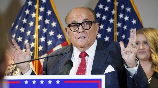 Giuliani doubled down on his conspiracy claims in an off-the-rails Thursday press conference alongside Trump lawyer Jenna Ellis and Sidney Powell, whom the campaign disowned on Sunday.(AP Photo) Giuliani doubled down on his conspiracy claims in an off-the-rails Thursday press conference alongside Trump lawyer Jenna Ellis and Sidney Powell, whom the campaign disowned on Sunday.(AP Photo)