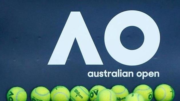 Tennis balls are pictured in front of the Australian Open logo before the tennis tournament.(REUTERS)