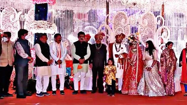 Yadav also circulated the pictures and videos of the reception on social media on Thursday morning in which hardly any guest seemed to wear a mask. HT could not verify the authenticity of the pictures and videos that went viral on social media.(HT PHOTO.) Yadav also circulated the pictures and videos of the reception on social media on Thursday morning in which hardly any guest seemed to wear a mask. HT could not verify the authenticity of the pictures and videos that went viral on social media.(HT PHOTO.)