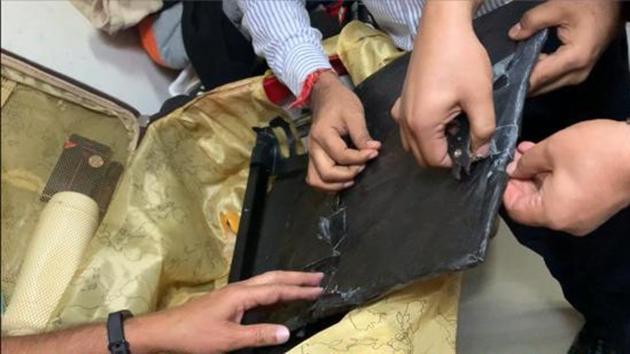 The accused had concealed the drugs in a false cavity made in the trolley bag. (HT) The accused had concealed the drugs in a false cavity made in the trolley bag. (HT)