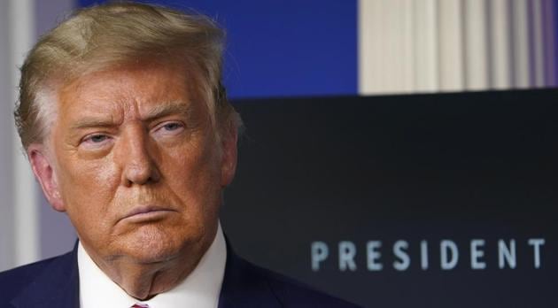 FILE - In this Friday, Nov. 20, 2020, file photo, President Donald Trump listens during an event in the briefing room of the White House in Washingto (AP Photo/Susan Walsh, File) FILE - In this Friday, Nov. 20, 2020, file photo, President Donald Trump listens during an event in the briefing room of the White House in Washingto (AP Photo/Susan Walsh, File)