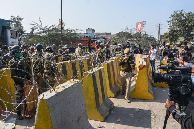 New Delhi: Enhanced security at Singhu border in view of the 'Delhi Chalo' protest march by farmers against the new farm laws.(PTI Photo)