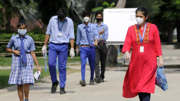 Noida, India - September 23, 2020: Students exit an examination centre after appearing for the Class X and Class XII CBSE Compartment Exam at Delhi Public School in Sector 30, Noida, India, on Wednesday, September 23, 2020. (Photo by Sunil Ghosh / Hindustan Times)