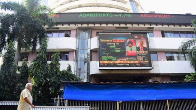 A digital screen on the facade of the Bombay Stock Exchange (BSE) building displays stock prices as Sensex soared.(PTI File Photo) A digital screen on the facade of the Bombay Stock Exchange (BSE) building displays stock prices as Sensex soared.(PTI File Photo)
