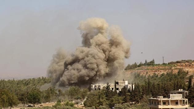 Smoke billows following a reported Russian airstrike on the western outskirts of the mostly rebel-held Syrian province of Idlib.(AFP)