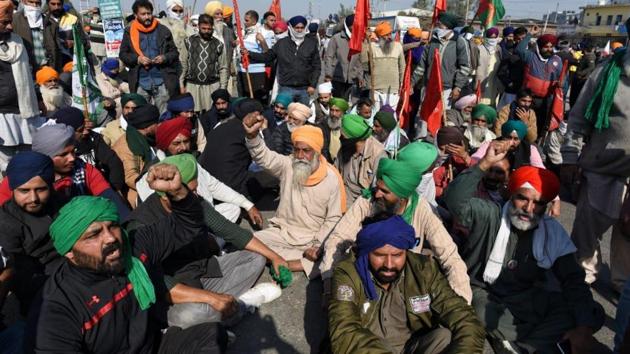 As the visuals of the protests on Delhi-Haryana border being stopped went viral, farmer bodies in at least 12 districts of Uttar Pradesh held protests and blocked traffic on highways with leaders calling the farmers to start a march towards Delhi from Saturday. (HT Photo) As the visuals of the protests on Delhi-Haryana border being stopped went viral, farmer bodies in at least 12 districts of Uttar Pradesh held protests and blocked traffic on highways with leaders calling the farmers to start a march towards Delhi from Saturday. (HT Photo)