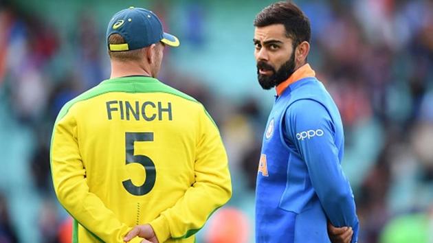 Virat Kohli and Aaron Finch.(Getty Images)