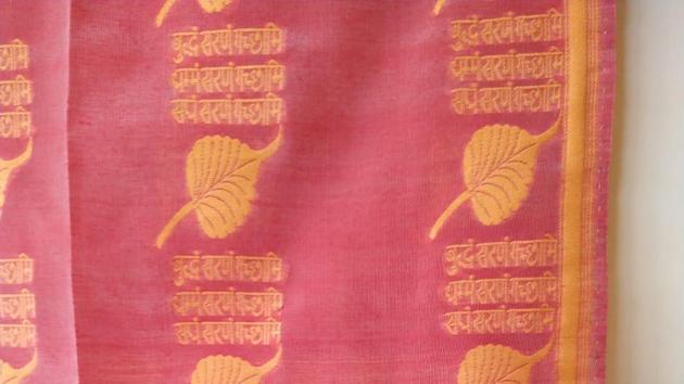 The special wover cloth for PM Modi also bears a leaf of the ‘Bodhivriksha’.(HT Photo) The special wover cloth for PM Modi also bears a leaf of the ‘Bodhivriksha’.(HT Photo)
