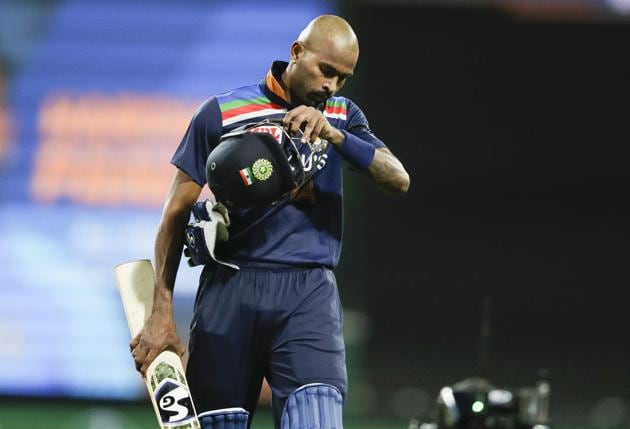 India's Hardik Pandya walks from th field after he was dismissed for 90 runs during the one day international cricket match between India and Australia at the Sydney Cricket Ground in Sydney, Australia, Friday, Nov. 27, 2020. (AP Photo/Rick Rycroft) (AP) 