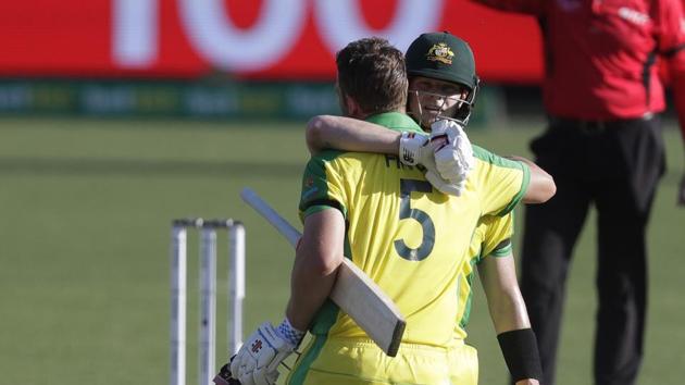 Australia's Aaron Finch is congratulated by teammate Steve Smith.(AP) Australia's Aaron Finch is congratulated by teammate Steve Smith.(AP)