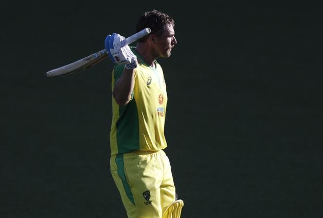 Australia's Aaron Finch waves to the crowd as he leaves the field after he was dismissed for 114 runs during the one day international cricket match between India and Australia at the Sydney Cricket Ground.(AP)