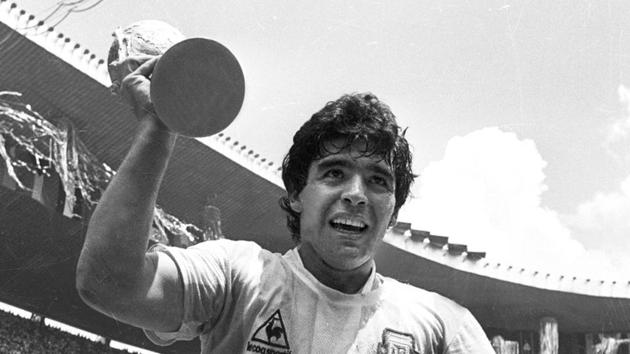 Maradona holds up the World Cup trophy as he is carried around the field in Azteca Stadium after Argentina defeated Germany 3-2 to win the World Cup in Mexico City in 1986. Maradona didn’t just play football, he transformed it, elevated it to an art.(Reuters File) Maradona holds up the World Cup trophy as he is carried around the field in Azteca Stadium after Argentina defeated Germany 3-2 to win the World Cup in Mexico City in 1986. Maradona didn’t just play football, he transformed it, elevated it to an art.(Reuters File)