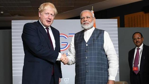 Britain's Prime Minister Boris Johnson with Indian Prime Minister Narendra Modi at a bilateral meeting during the G7 summit in Biarritz, France on August 25, 2019.(Reuters File Photo)