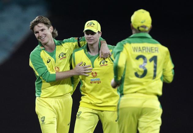 Sydney: Australia's Adam Zampa, left, and teammate Steve Smith celebrate the dismissal of India's K.L. Rahul during the one day international cricket match between India and Australia at the Sydney Cricket Ground in Sydney, Australia, Friday, Nov. 27, 2020. AP/PTI(AP27-11-2020_000152B) (AP) 