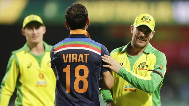 Sydney: India's Virat Kohli congratulates Australia's Aaron Finch, right, after the one day international cricket match between India and Australia at the Sydney Cricket Ground in Sydney, Australia, Friday, Nov. 27, 2020.Australia defeated India by 66 runs. AP/PTI(AP27-11-2020_000174A) (AP)