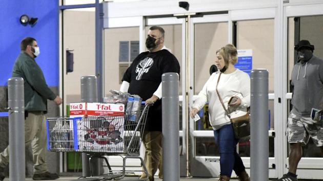 Shoppers leave Walmart around 5:30 a.m. on Friday in Ashtabula Township, Ohio. (AP Photo) Shoppers leave Walmart around 5:30 a.m. on Friday in Ashtabula Township, Ohio. (AP Photo)