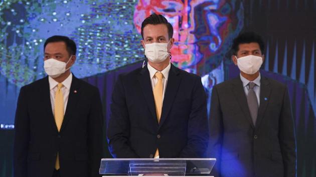 James Teague, center, president of AstraZeneca's in Thailand attends a signing ceremony at Government House in Bangkok, Thailand. Thailand signed a deal to procure 26 million doses of the trial coronavirus vaccine developed by pharmaceutical firm AstraZeneca. (AP) James Teague, center, president of AstraZeneca's in Thailand attends a signing ceremony at Government House in Bangkok, Thailand. Thailand signed a deal to procure 26 million doses of the trial coronavirus vaccine developed by pharmaceutical firm AstraZeneca. (AP)