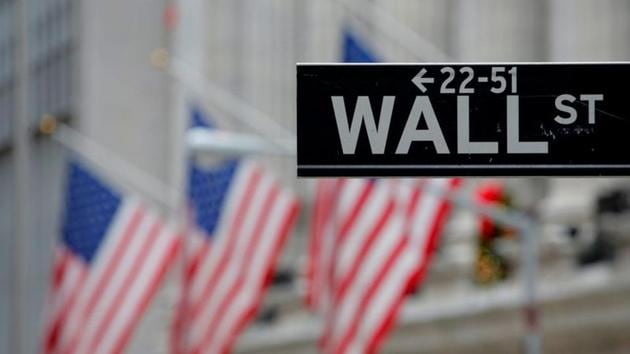 A street sign for Wall Street is seen outside the New York Stock Exchange (NYSE) in Manhattan, New York City.(Reuters File Photo) A street sign for Wall Street is seen outside the New York Stock Exchange (NYSE) in Manhattan, New York City.(Reuters File Photo)