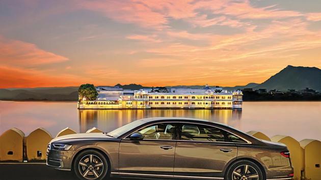 The Audi A8 looks perfectly at home set against the magnificent Taj Lake Palace in Udaipur