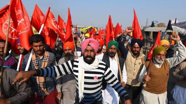 Farmers from Punjab raise slogans against central goverment during a protest over farm reform laws, at Singhu Delhi-Haryana Border, in New Delhi. (Raj K Raj/HT PHOTO) Farmers from Punjab raise slogans against central goverment during a protest over farm reform laws, at Singhu Delhi-Haryana Border, in New Delhi. (Raj K Raj/HT PHOTO)