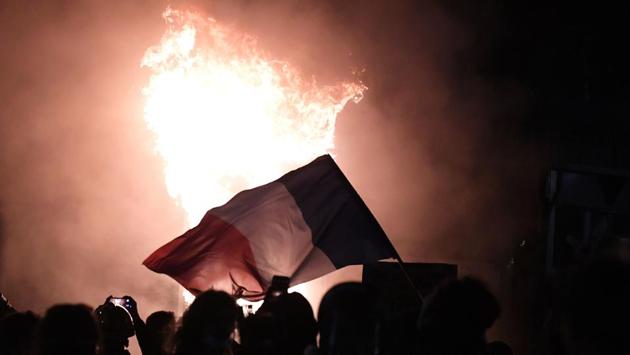 Demonstrators wave the French tricolour during a protest against the new security legislation—Article 24, in Paris on November 28. Article 24 was passed by the National Assembly although it is awaiting Senate approval. (Alain Jocard / AFP) Demonstrators wave the French tricolour during a protest against the new security legislation—Article 24, in Paris on November 28. Article 24 was passed by the National Assembly although it is awaiting Senate approval. (Alain Jocard / AFP)