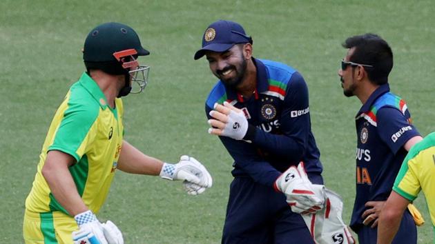 Australia's Aaron Finch jokes with India's KL Rahul during the match.(REUTERS) Australia's Aaron Finch jokes with India's KL Rahul during the match.(REUTERS)