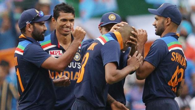 Hardik Pandya celebrates the wicket of Australia's Steven Smith with teammates.(REUTERS)