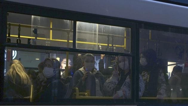 Commuters wearing masks to help protect against the spread of coronavirus, travel in a bus in Ankara, Turkey.(AP) Commuters wearing masks to help protect against the spread of coronavirus, travel in a bus in Ankara, Turkey.(AP)