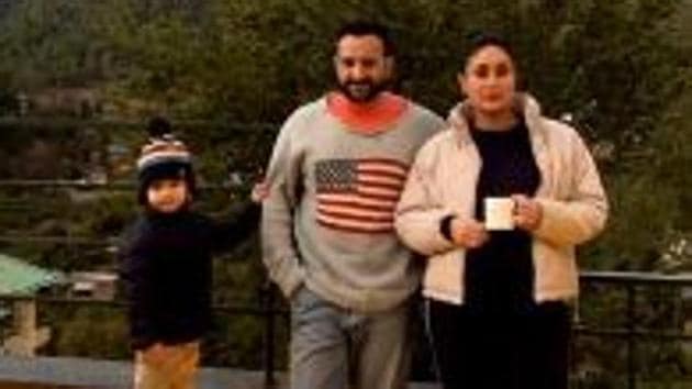 Saif Ali Khan poses with Kareena Kapoor Khan and Taimur Ali Khan.