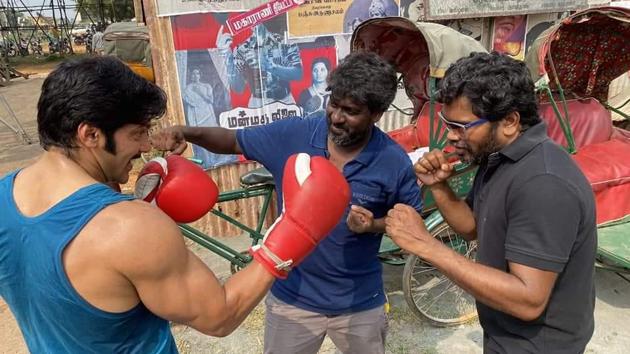 Pa Ranjith with Arya during the filming of Salpetta. Pa Ranjith with Arya during the filming of Salpetta.