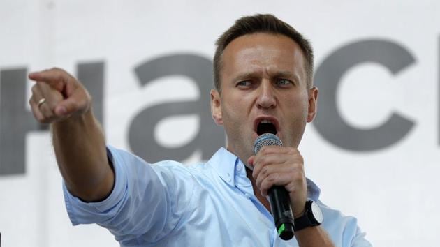 Russian opposition activist Alexei Navalny gestures while speaking to a crowd during a political protest in Moscow. Russia came under renewed pressure to explain the nerve agent attack on opposition figure Alexei Navalny as the annual meeting of the global chemical weapons watchdog got underway in The Hague, Netherlands.(AP/ File photo) Russian opposition activist Alexei Navalny gestures while speaking to a crowd during a political protest in Moscow. Russia came under renewed pressure to explain the nerve agent attack on opposition figure Alexei Navalny as the annual meeting of the global chemical weapons watchdog got underway in The Hague, Netherlands.(AP/ File photo)