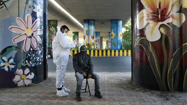 At present, people have to spend Rs 2,400 for the RT-PCR test at private labs.(PTI) At present, people have to spend Rs 2,400 for the RT-PCR test at private labs.(PTI)