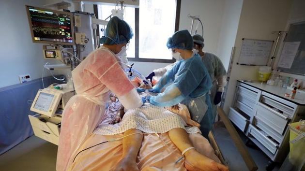 Medical staff members work in the Intensive Care Unit (ICU) where patients suffering from the coronavirus disease (Covid-19) are treated at the Pasteur hospital in Nice, France. (Reuters) Medical staff members work in the Intensive Care Unit (ICU) where patients suffering from the coronavirus disease (Covid-19) are treated at the Pasteur hospital in Nice, France. (Reuters)