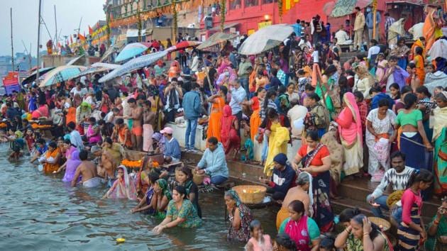 Devotees gather to take holy dip in the Ganga River on the occasion of Kartik Purnima, in Varanasi on Monday.(PTI Photo) Devotees gather to take holy dip in the Ganga River on the occasion of Kartik Purnima, in Varanasi on Monday.(PTI Photo)