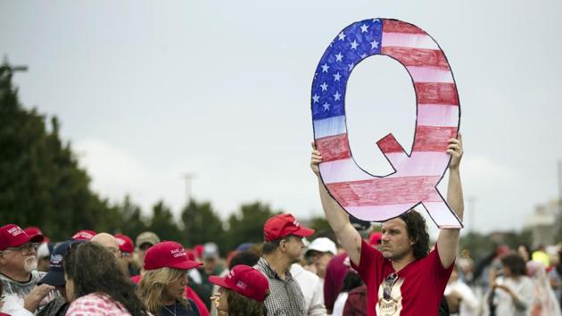 The spread of QAnon globally could have real-world consequences such as decreased uptake of Covid-19 vaccines(AP) The spread of QAnon globally could have real-world consequences such as decreased uptake of Covid-19 vaccines(AP)