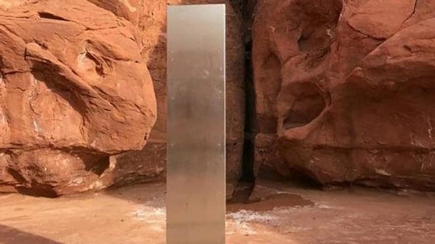 The metal monolith installed in the ground in a remote area of red rock in Utah. (AP) The metal monolith installed in the ground in a remote area of red rock in Utah. (AP)
