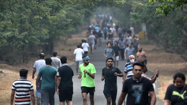 Morning walkers and joggers out at Sanjay Gandhi National Park in Mumbai on November 28. “In the past 15 days, the testing has gone up, and we have also witnessed a little surge in the daily cases being reported. With the increase in testing, we will have to wait and watch at least till December 15 to understand better the post-Diwali surge,” a BMC official told HT. (Satish Bate / HT Photo)