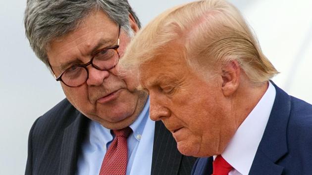 In this file photo taken on September 1, 2020, US President Donald Trump (right) and US Attorney General William Barr step off Air Force One upon arrival at Andrews Air Force Base in Maryland.(AFP/ FILE)