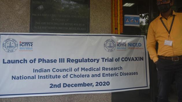 A banner is put up on the occasion of the launch of Phase III Regulatory Trial of the COVAXIN coronavirus vaccine, at NICED Beleghata in Kolkata, West Bengal.(Samir Jana/Hindustan Times) A banner is put up on the occasion of the launch of Phase III Regulatory Trial of the COVAXIN coronavirus vaccine, at NICED Beleghata in Kolkata, West Bengal.(Samir Jana/Hindustan Times)