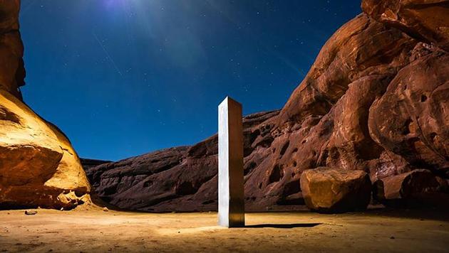 AThis Nov. 27, 2020 photo by Terrance Siemon shows a monolith that was placed in a red-rock desert in an undisclosed location in San Juan County southeastern Utah. New clues have surfaced in the disappearance of the gleaming monolith in Utah that seemed to melt away as mysteriously as it appeared in the red-rock desert. A Colorado photographer told a TV station in Salt Lake City that he saw four men push over the hollow, stainless steel structure in Utah on Friday night. (AP) AThis Nov. 27, 2020 photo by Terrance Siemon shows a monolith that was placed in a red-rock desert in an undisclosed location in San Juan County southeastern Utah. New clues have surfaced in the disappearance of the gleaming monolith in Utah that seemed to melt away as mysteriously as it appeared in the red-rock desert. A Colorado photographer told a TV station in Salt Lake City that he saw four men push over the hollow, stainless steel structure in Utah on Friday night. (AP)