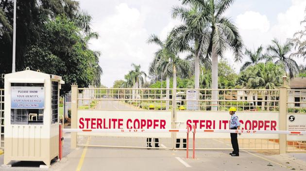 A private security guard stands in front of the main gate of Sterlite Industries Ltd's copper plant in Tuticorin.(REUTERS) A private security guard stands in front of the main gate of Sterlite Industries Ltd's copper plant in Tuticorin.(REUTERS)
