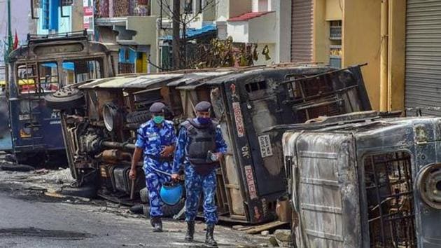 Rapid Action Force (RAF) personnel carry out a flag march in the riot-hit area of Bengaluru, on August 13, 2020.(PTI File Photo) Rapid Action Force (RAF) personnel carry out a flag march in the riot-hit area of Bengaluru, on August 13, 2020.(PTI File Photo)
