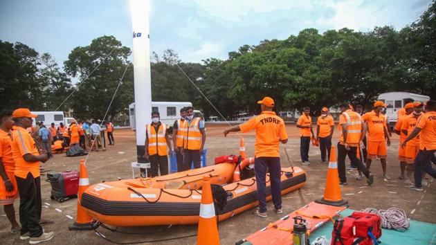Tamil Nadu Disaster Response Force personnel prepare themselves ahead of Cyclone Burevi, in Kanyakumari on Wednesday.(PTI Photo)