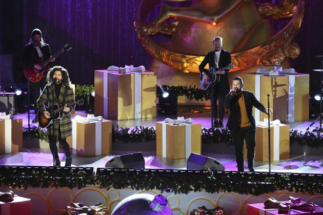 IMAGE DISTRIBUTED FOR TISHMAN SPEYER - Dan + Shay perform at the 88th Rockefeller Center Christmas Tree Lighting Ceremony, Wednesday, Dec. 2, 2020, in New York. The lit tree will be on display starting Thursday, December 3, through early January 2021 and will also will be livestreamed each day from 8 am to midnight at rockefellercenter.com. (AP) IMAGE DISTRIBUTED FOR TISHMAN SPEYER - Dan + Shay perform at the 88th Rockefeller Center Christmas Tree Lighting Ceremony, Wednesday, Dec. 2, 2020, in New York. The lit tree will be on display starting Thursday, December 3, through early January 2021 and will also will be livestreamed each day from 8 am to midnight at rockefellercenter.com. (AP)