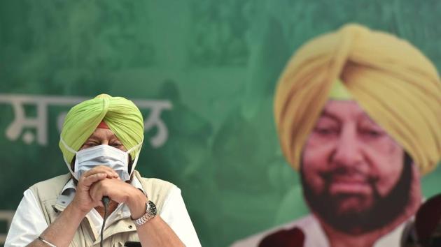 Punjab chief minister Captain Amarinder Singh participates in a protest against the recent farm reform bills, at Jantar Mantar in New Delhi earlier, on November 4.(File photo) Punjab chief minister Captain Amarinder Singh participates in a protest against the recent farm reform bills, at Jantar Mantar in New Delhi earlier, on November 4.(File photo)