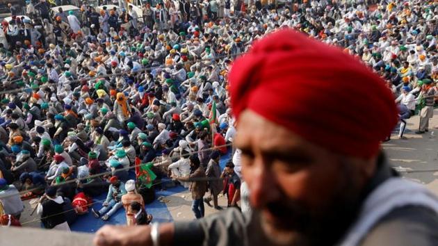 Farmers attend a protest against the newly passed farm bills at Singhu border near Delhi, India. (Reuters) Farmers attend a protest against the newly passed farm bills at Singhu border near Delhi, India. (Reuters)