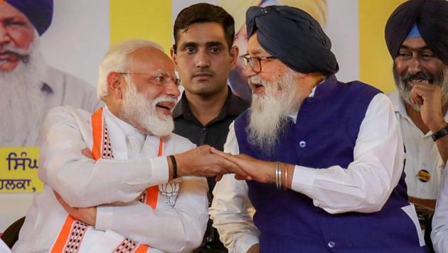 File Photo: Prime Minister Narendra Modi with Shiromani Akali Dal leader Parkash Singh Badal in Bathinda (PTI Photo) (PTI27-09-2020_000052A)