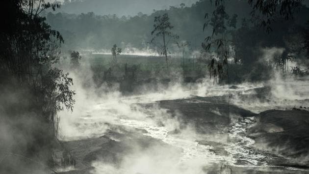 A view of a steaming stream caused by flowing lava in Lumajang, East Java province, Indonesia on December 2. Local disaster agency chief Agus Triono warned on December 2 that residents could still be at risk as heavy rains threatened to trigger more volcanic flows from the still-spewing crater, AFP reported. (Juni Kriswanto / AFP)