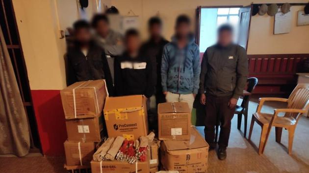 The six arrested persons along with a portion of the seized explosives. (Photo: Meghalaya Police) The six arrested persons along with a portion of the seized explosives. (Photo: Meghalaya Police)